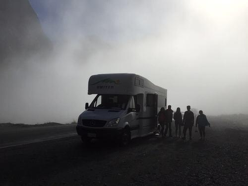 We and our New Zealand RV amidst the clouds at Milford Sound - New Zealand South Island ! -3 Boys 3 Girls 1 Campervan 1 Road Trip