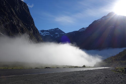 Amidst the clouds with the sun rays seeping through as we trot along to Milford Sound