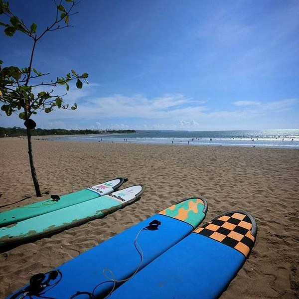 Surf that wave, our beautiful surfboards overlooking kuta beach