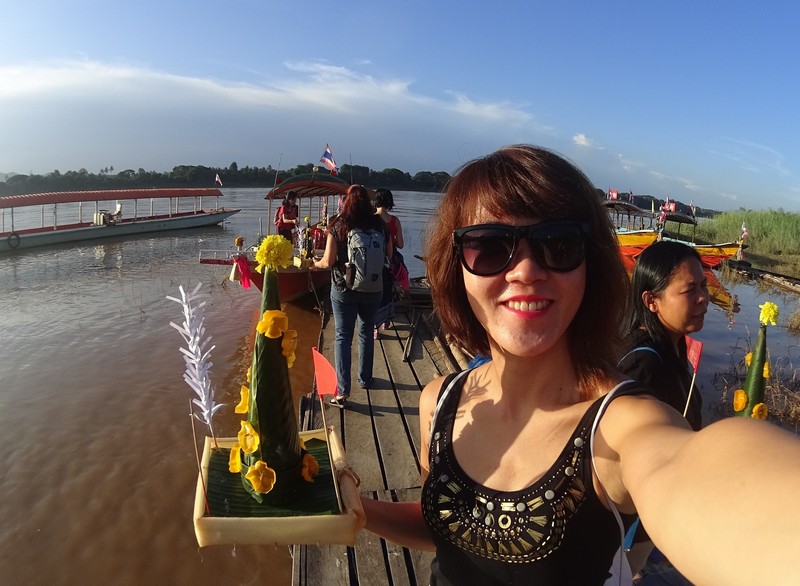 Heading to our long tail boat for the river cruise down the Mekong River