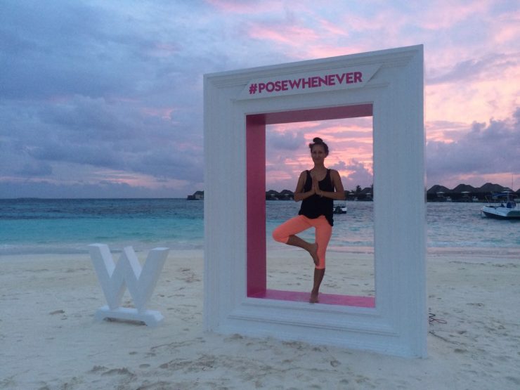 Skies of crimson pink at sunset, perfect for yogi photos! | Relax the back and stretch