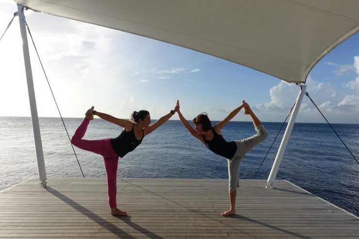 Doing a dancer pose at AWAY SPA Maldives | Yogi in Action
