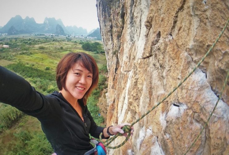 Rock climbing and Bouldering Women who loves outdoor climbing in Yangshuo China.