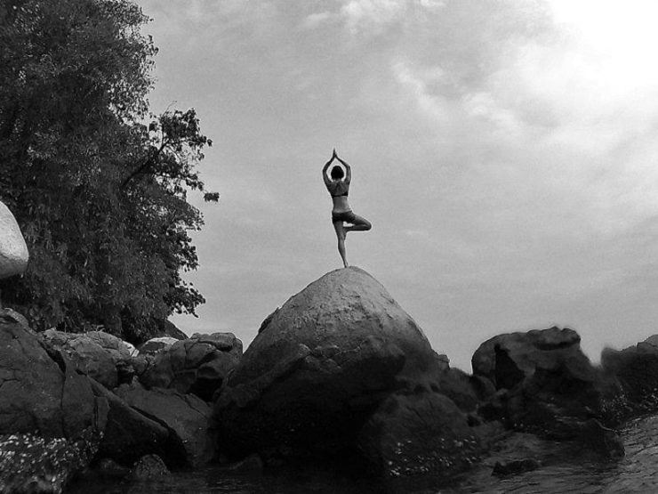Yoga on the rock in tioman