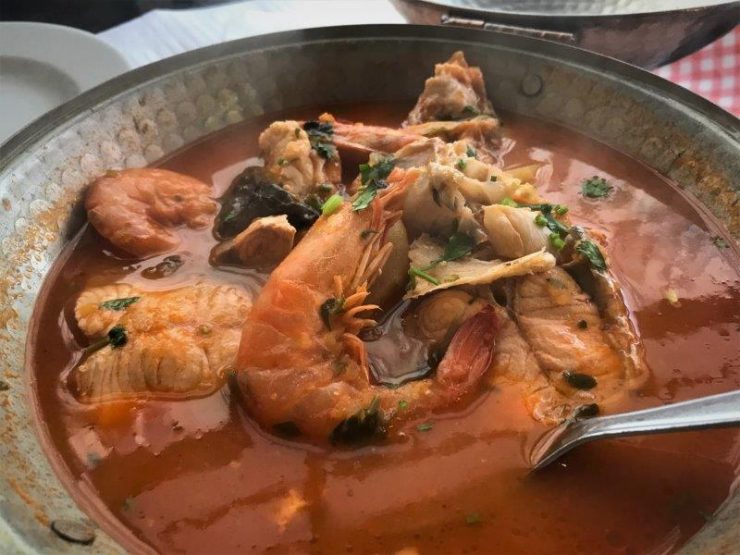 Cataplana soup dish - seafood soup with fish and shellfish. Taste quite chinese style of preparation actually. Amazing clams at a restaurant by the shore near Serra da Arrabida National Park. Best Lisbon Seafood!