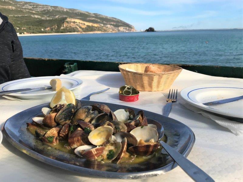 Amazing clams at a restaurant by the shore near Serra da Arrabida National Park. Best Lisbon Seafood!