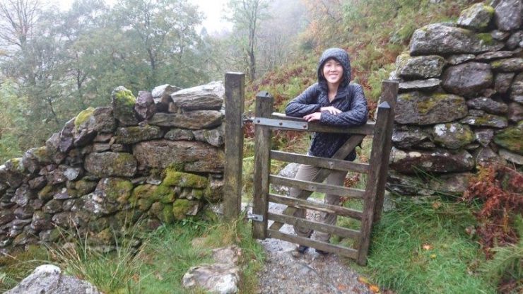 Posing at the fence at the start of the trail up to Mount Cadair Idris