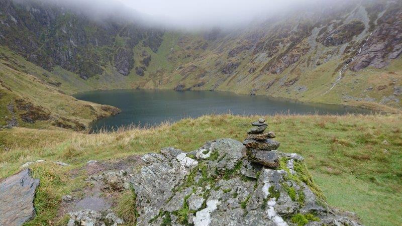 heart shape lake with stones