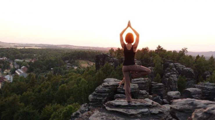 Yoga at sunset at Tisa Rock