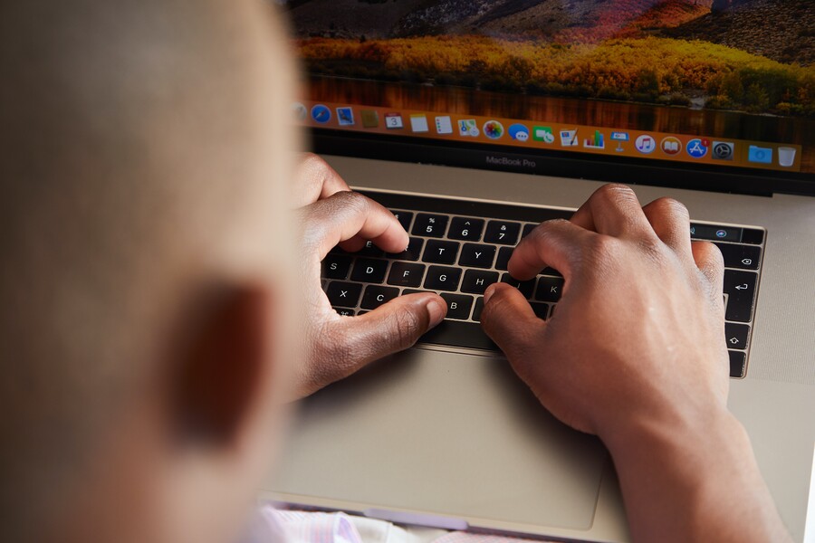Checking something on laptop checking something on laptop