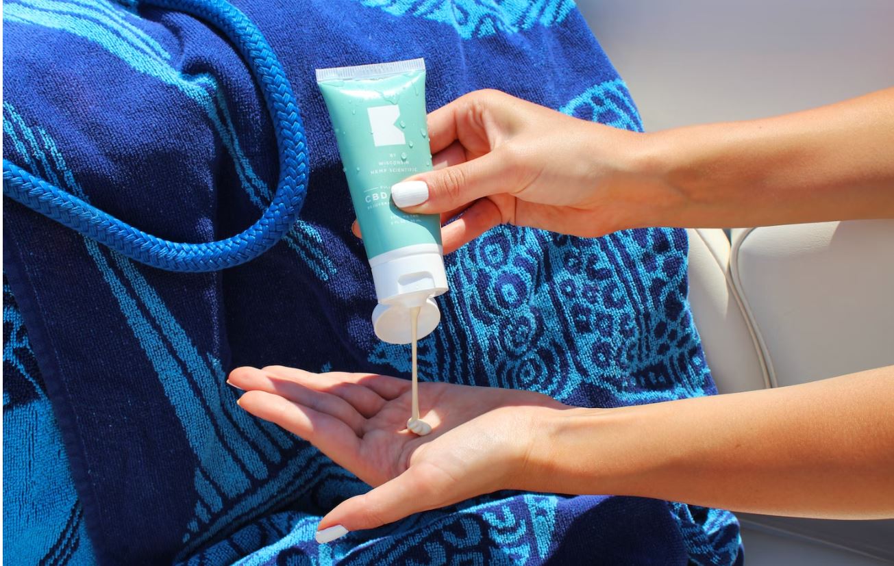 applying sunscreen Apply sunscreen and wear long-sleeved clothes to protect you from sunburns