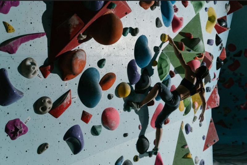 Bouldering channels all muscle groups, making it a great fitness activity.