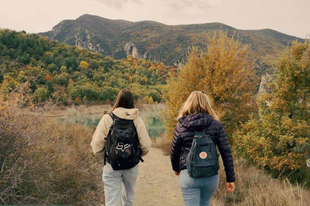 women walking together Do your proper research before going on a trip, be it for solo traveling or with friends