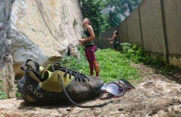 black and yellow climbing shoes outdoors