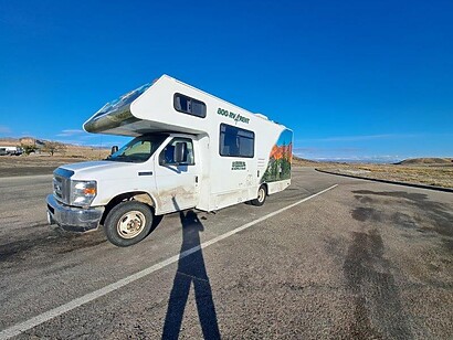 side view of white rv parked white rv campervan outdoor stretch of highway road