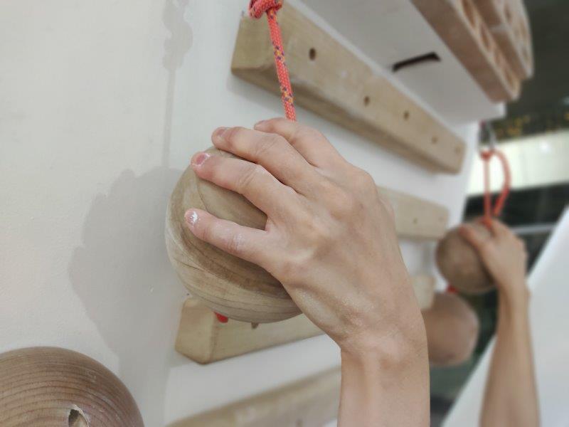 wooden pull up grips in gym