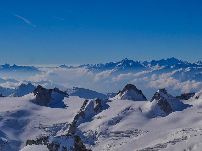the swiss alps are known for their stunning snow capped peaks.