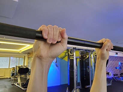 close up shot of pull up bar grip with both hands close up shot of pull up bar grip with both hands