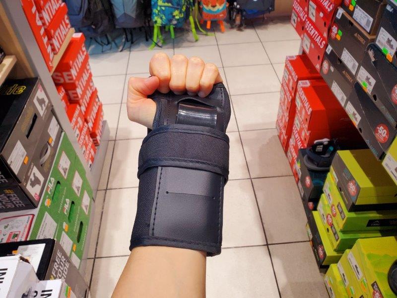 Complete Guide to Buying Wrist Guards - wearing black wrist guard front view