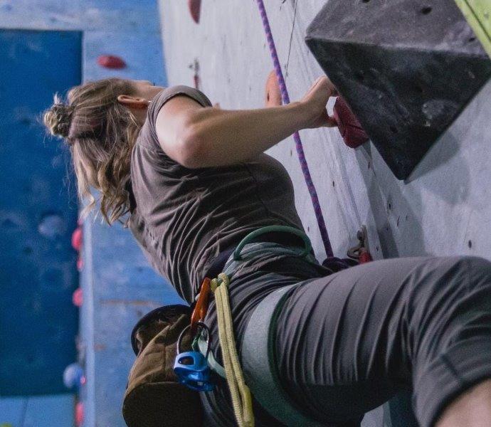 Best Prana Climbing Pants - close up of female climber in black