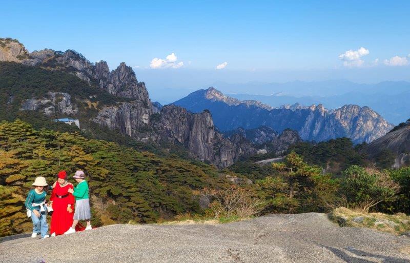 tourists on huangshan mountain trails