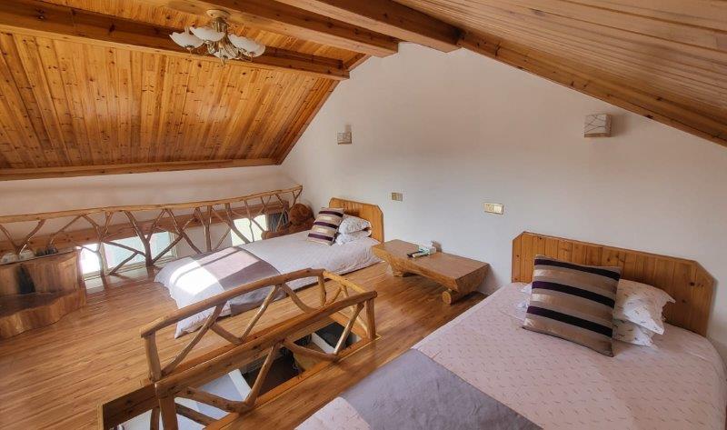 upstairs of loft in huangshan tingquan xiaoyuan b&b