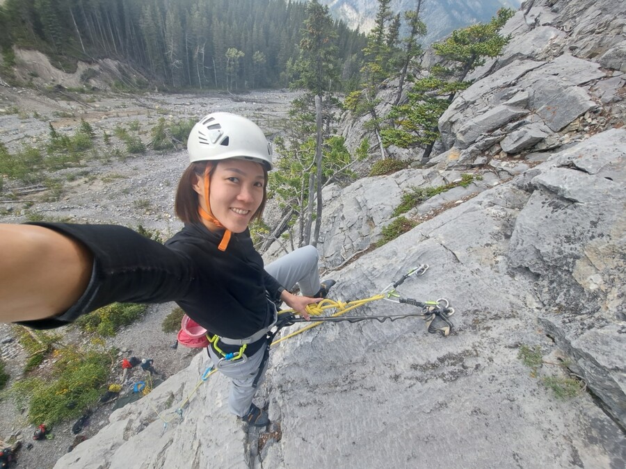 close up view while rock climbing with white safety helmet Rock Climbing in New Mexico
