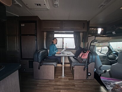 digital nomad working in a campervan