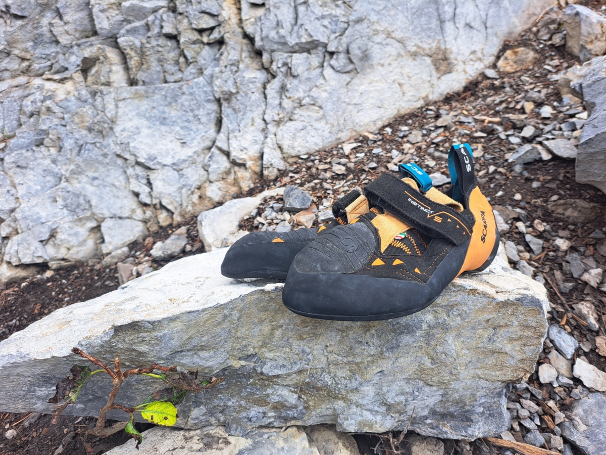 front view orange and black scarpa climbing shoes for outdoor climbing