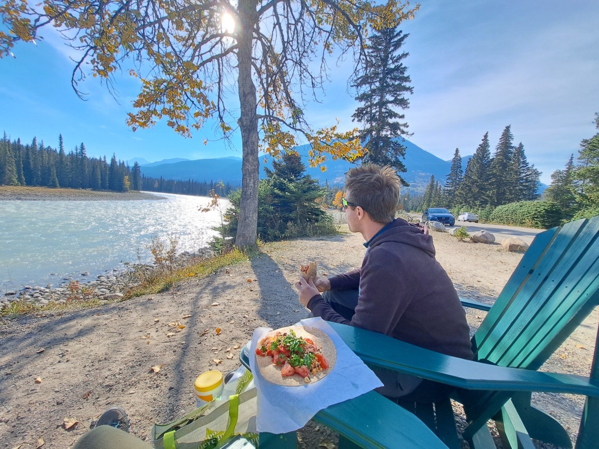 eating the our own handmade wraps with a scenic lake view is a great way to slow down when traveling