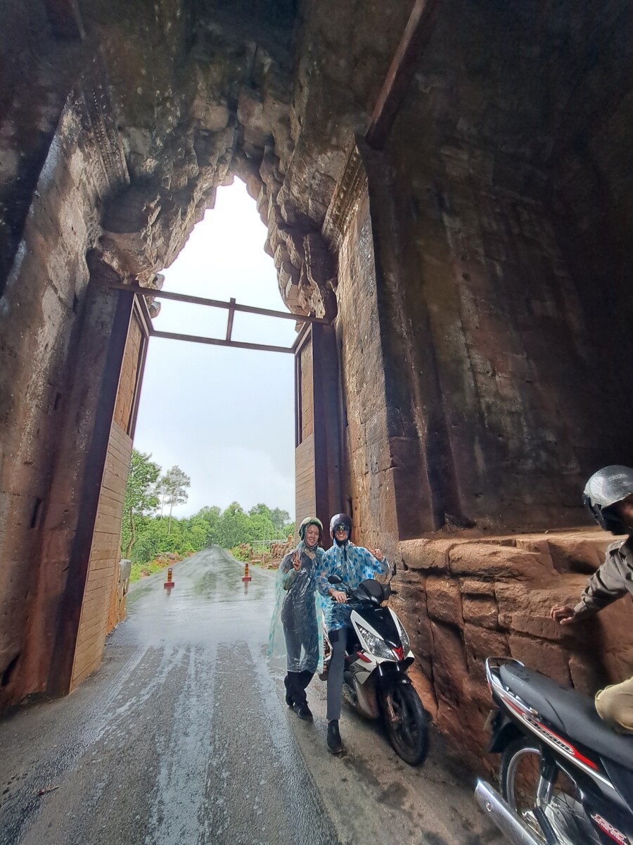 taking shelter under an arch in Cambodia
